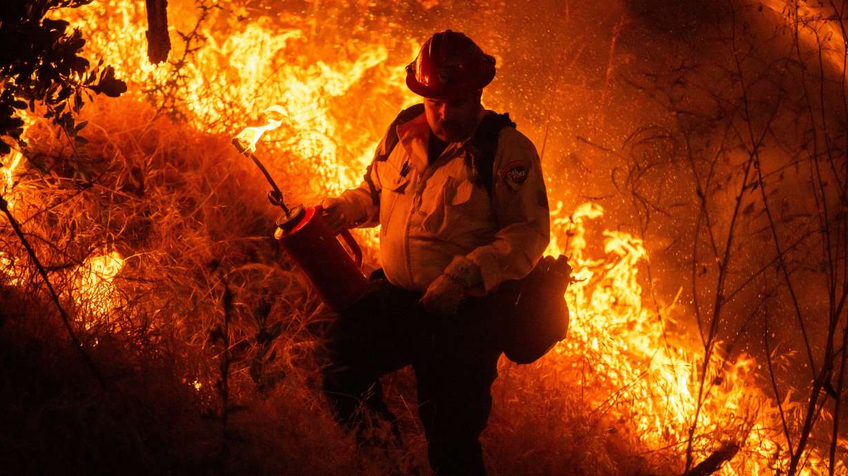Fire crews conduct a firing operation to control the Sandy Fire Monday, May 18, 2026, in Simi Valley, Calif.