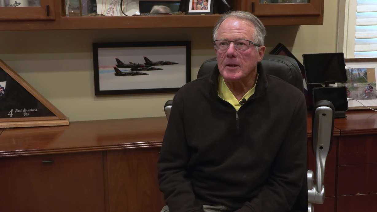 Paul Strickland, a retired Air Force pilot, in Layton on Monday, talks about a video of two planes colliding during an air show Sunday at Mountain Home Air Force Base in Idaho.