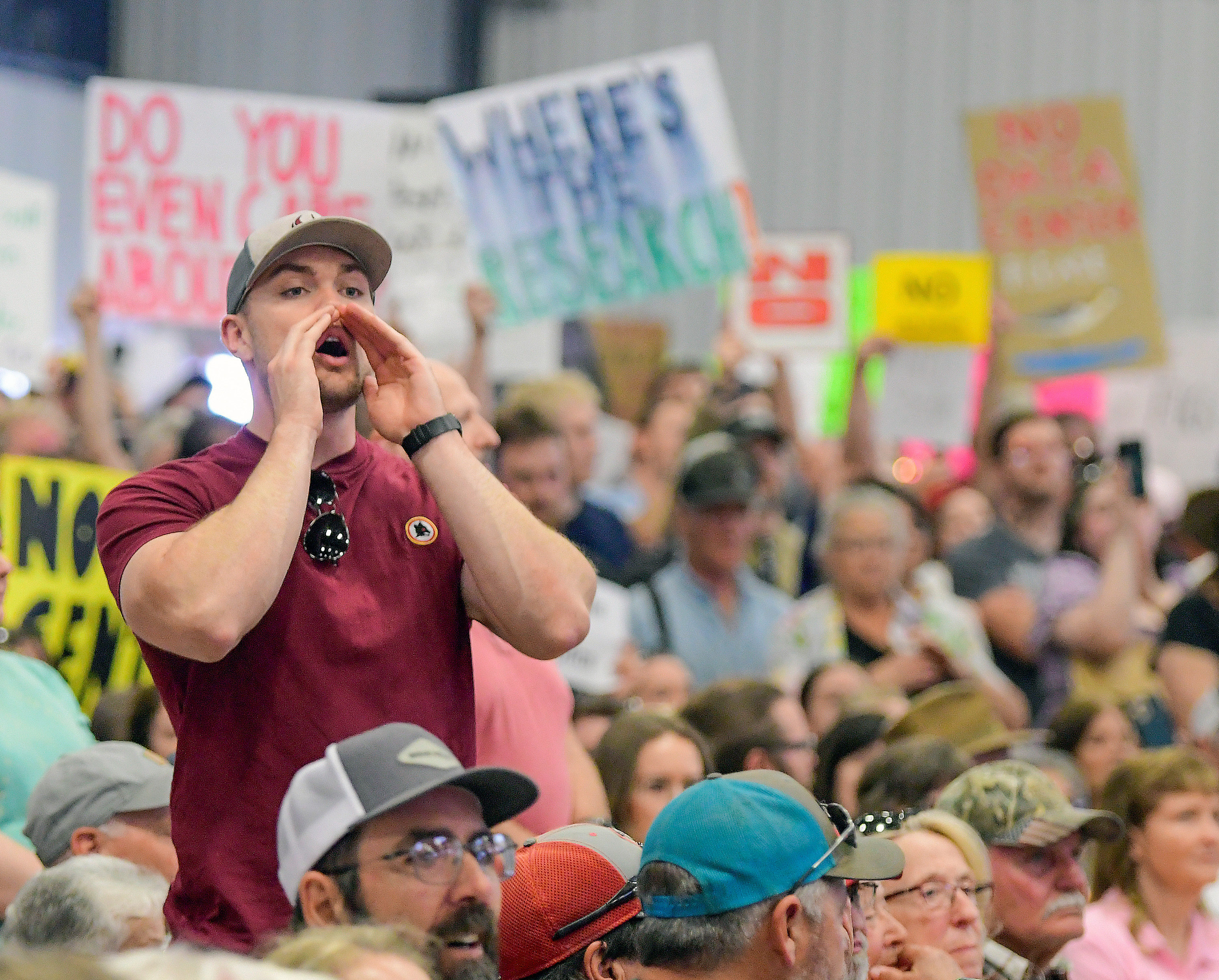 A man yells at members of the Box Elder County Commission during a May 4 meeting in Tremonton when the data center proposal put forward by O'Leary Digital was discussed.