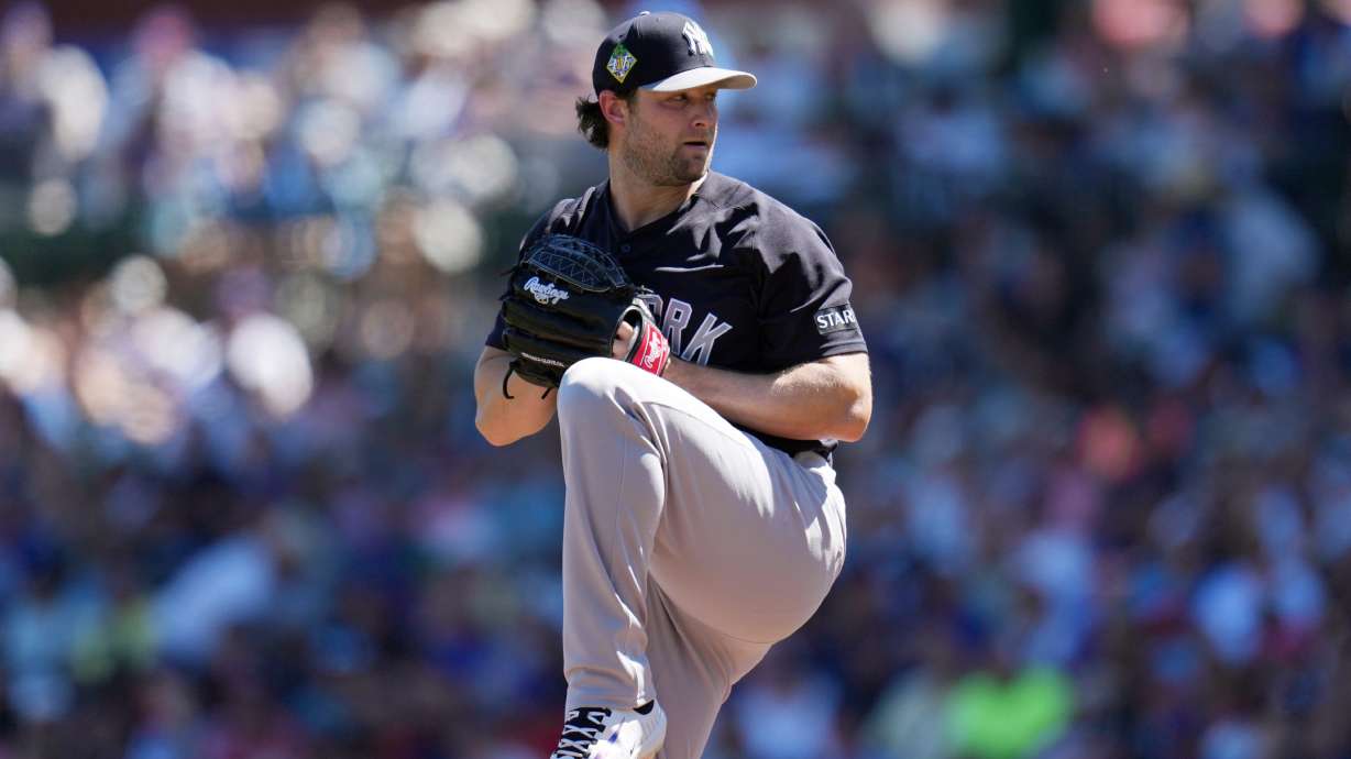FILE - New York Yankees starting pitcher Gerrit Cole throws against the Chicago Cubs during the first inning of a spring training baseball game, Tuesday, March 24, 2026, in Mesa, Ariz.