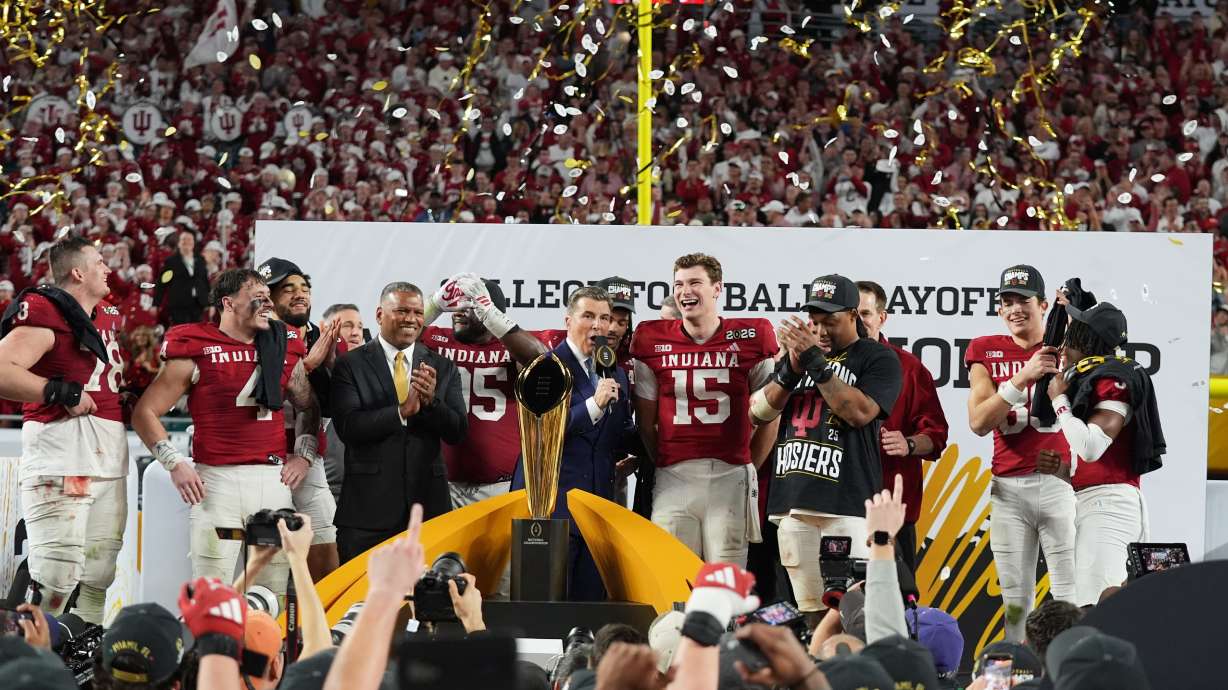 FILE - Indiana quarterback Fernando Mendoza (15) is interviewed during the trophy ceremony after Indiana defeated Miami in a College Football Playoff national championship game, Jan. 19, 2026, in Miami Gardens, Fla.