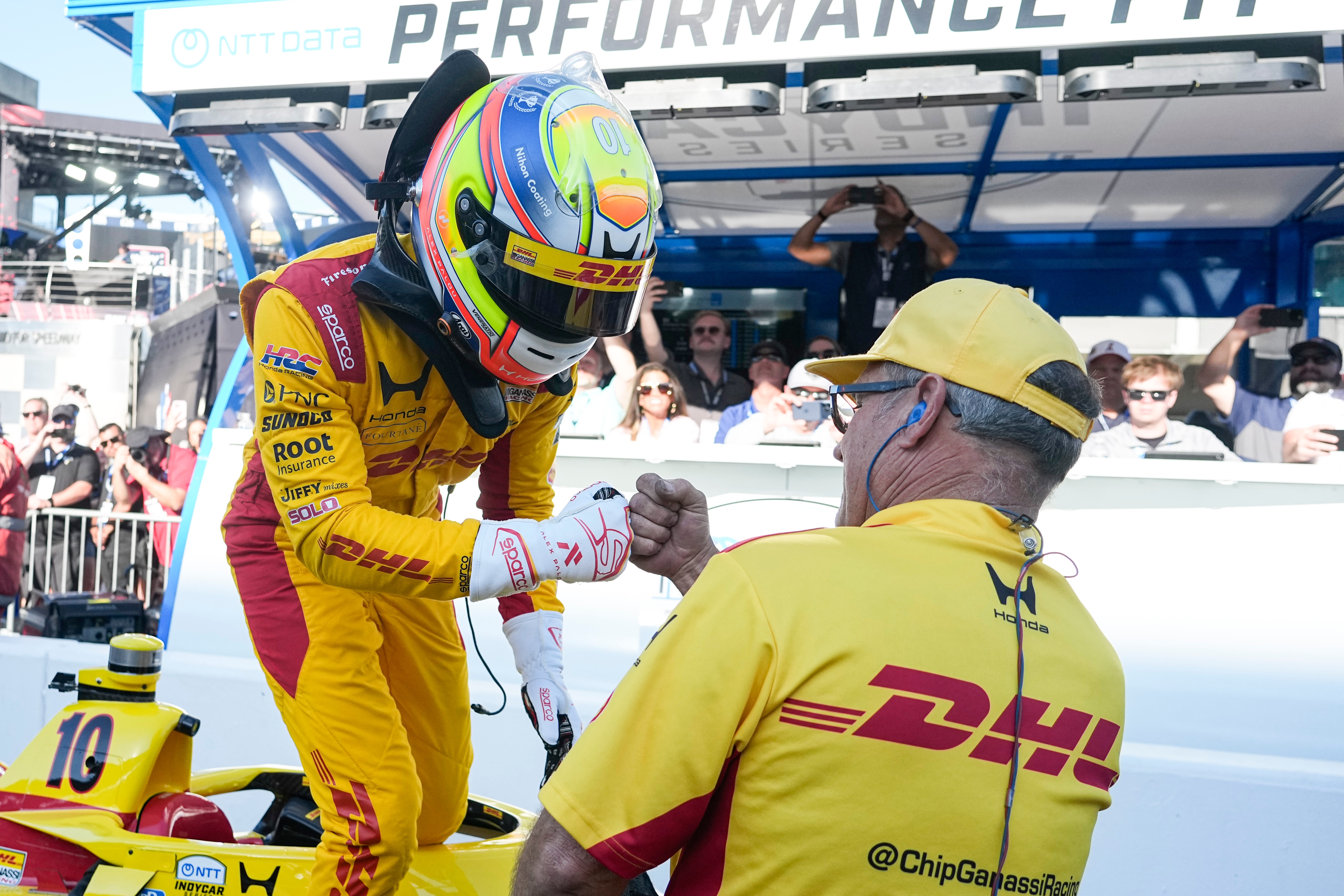 Alex Palou, of Spain, celebrates with a member of his crew during qualifications for the Indianapolis 500 auto race at the in Indianapolis, Sunday, May 17, 2026. 