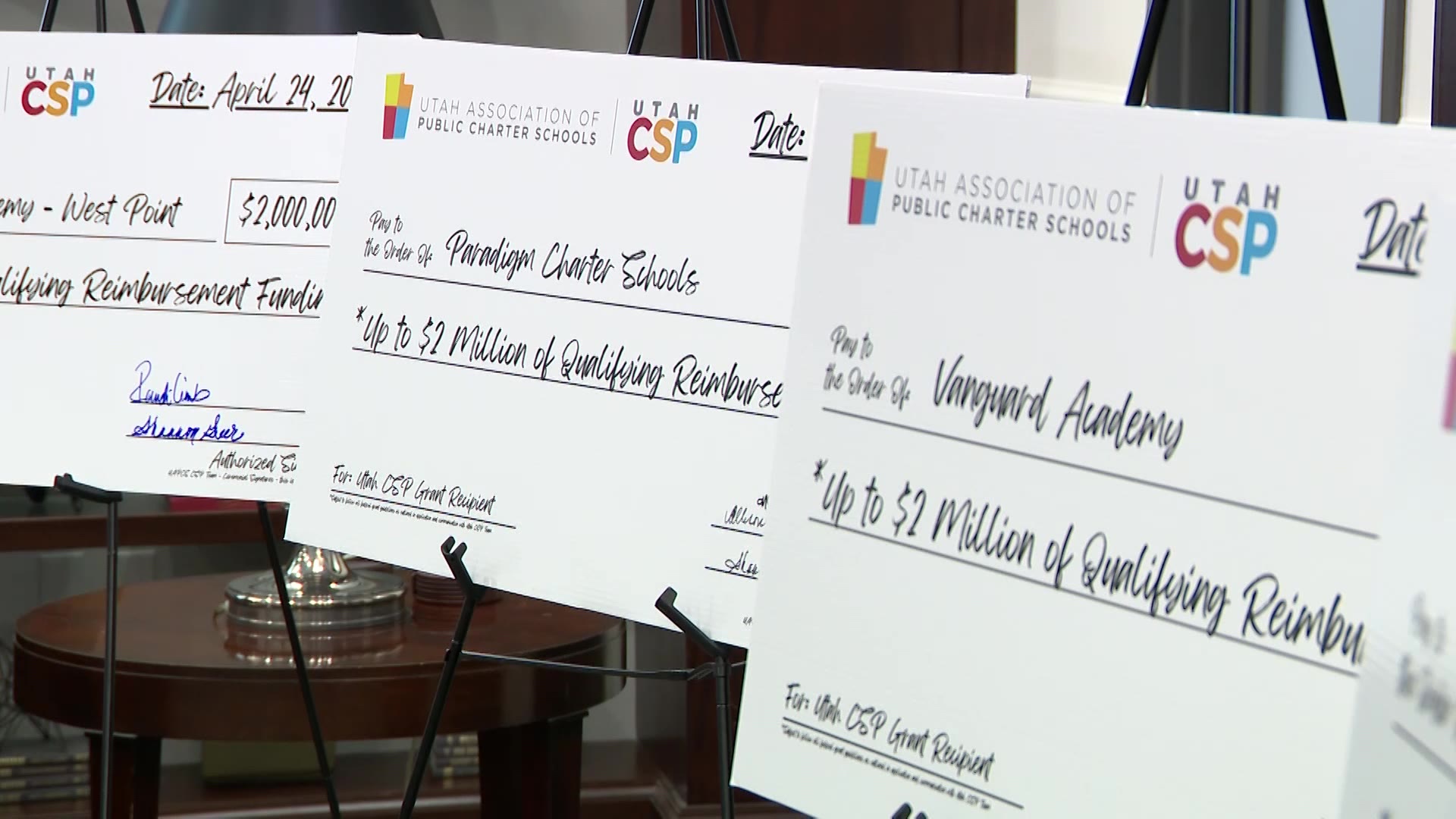 Federal grants awarded to four Utah charter schools are pictured, Tuesday. The four schools will receive up to $2 million to help expand learning opportunities for students statewide.