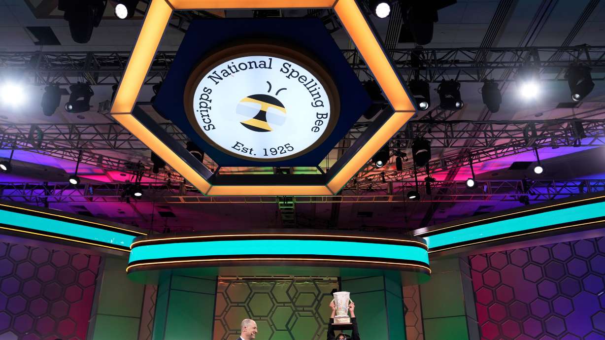 E.W. Scripps Company president and CEO Adam Symson presents the trophy to Faizan Zaki, 13, of Dallas, the winner of the 2025 Scripps National Spelling Bee, May 29, 2025, in Oxon Hill, Md. Take a look at America's most misspelled word top 10 list.