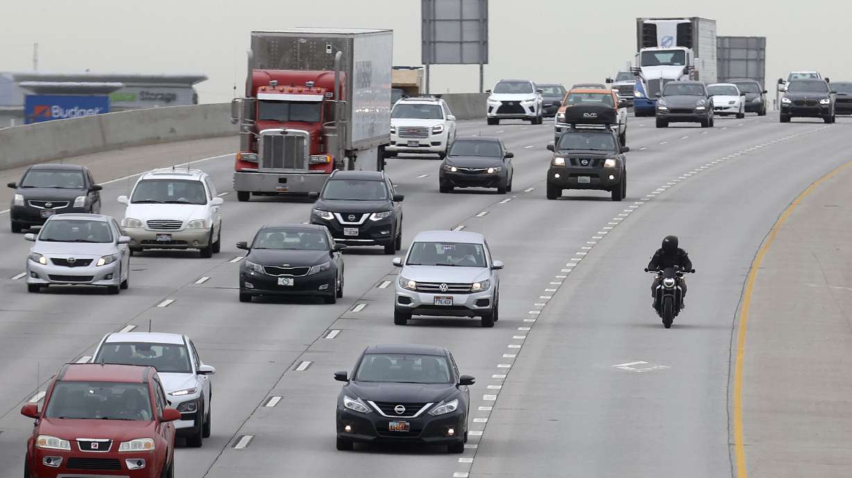 Vehicles travel on northbound I-15 in Murray on April 21, 2021. Utah Highway Patrol troopers said last week that they are open to increasing awareness laws that prevent left-lane loafers.