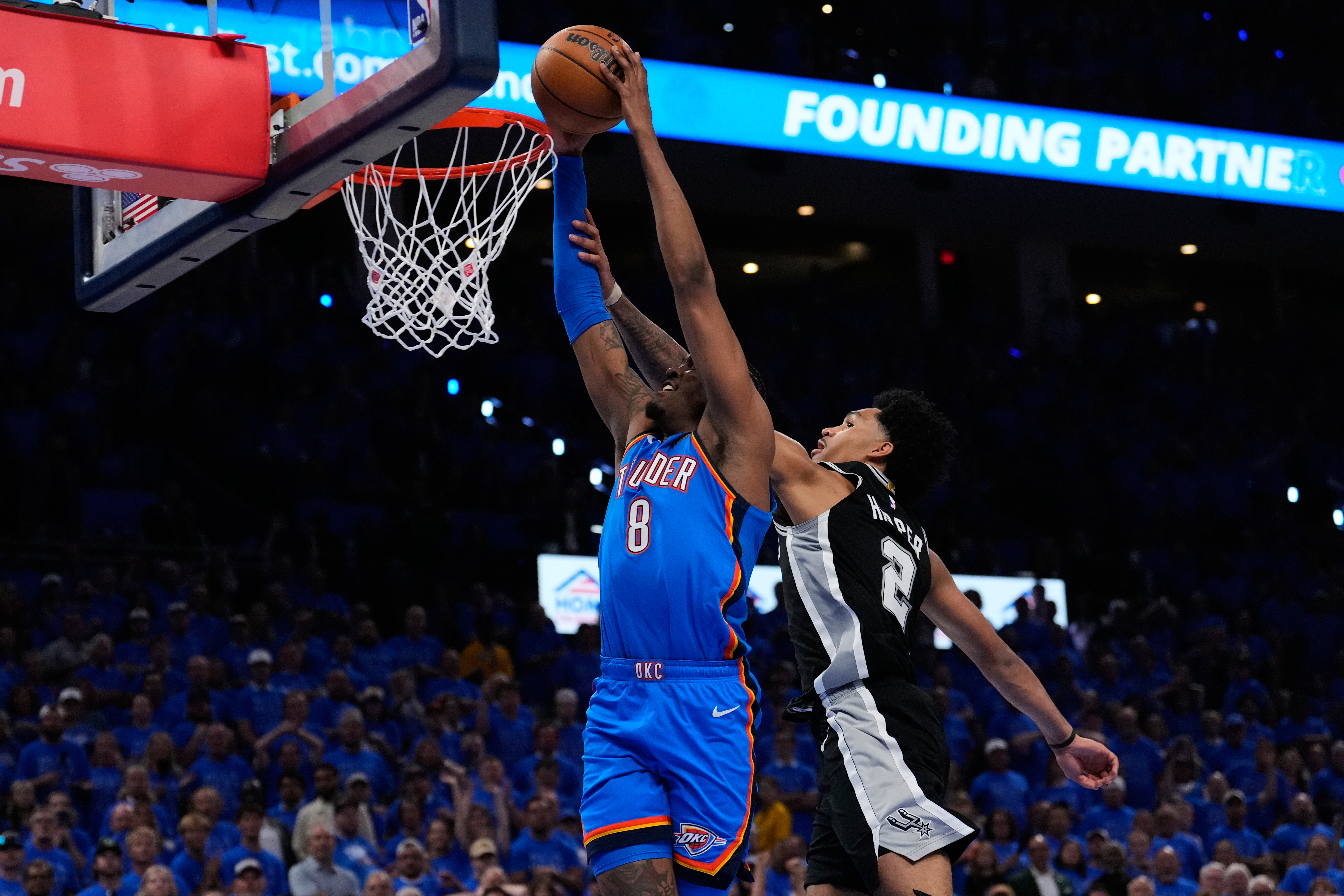 Oklahoma City Thunder guard Jalen Williams (8) shoots against San Antonio Spurs guard Dylan Harper (2) during overtime of Game 1 in a third-round NBA basketball playoffs series Monday, May 18, 2026, in Oklahoma City. 