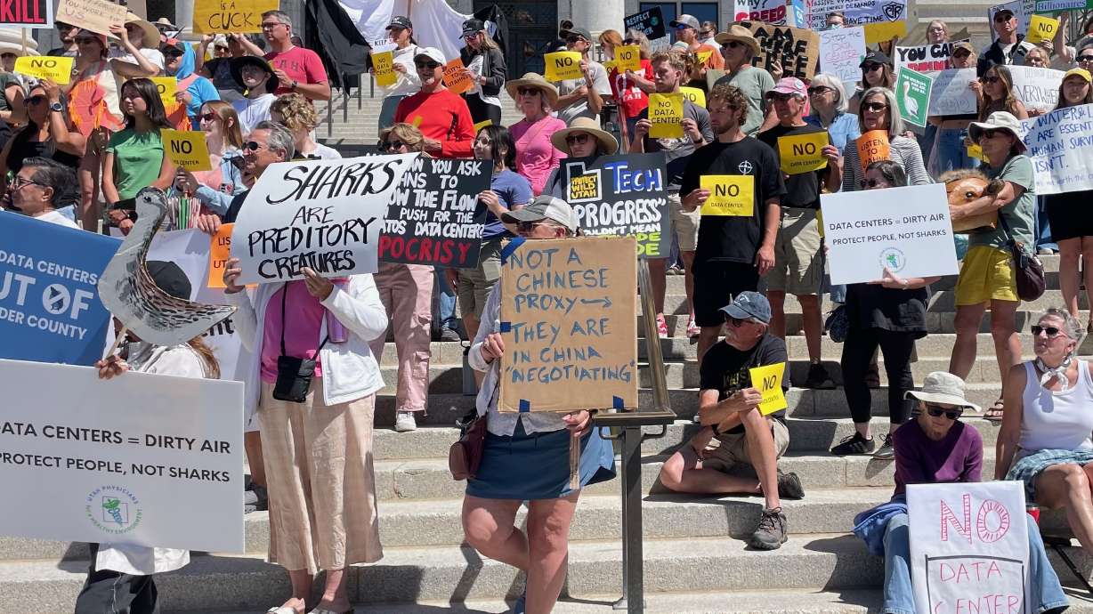 A businessman behind the Box Elder County data center plans is stepping back from charges that foes are linked to China and instead focusing on their funding sources. The May 14 photo shows a protest against the plans at the Capitol in Salt Lake City.