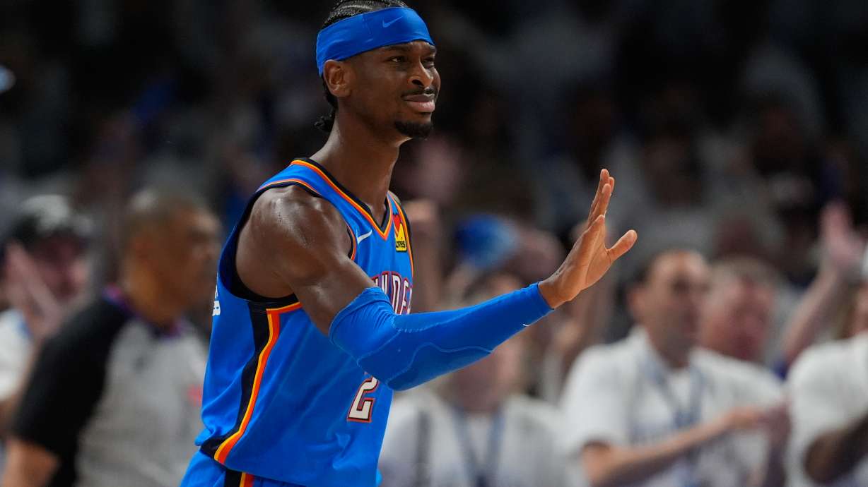 Oklahoma City Thunder guard Shai Gilgeous-Alexander celebrates after making a 3-pointer during the second half of Game 2 in the Western Conference finals NBA basketball playoffs series against the San Antonio Spurs Wednesday, May 20, 2026, in Oklahoma City.