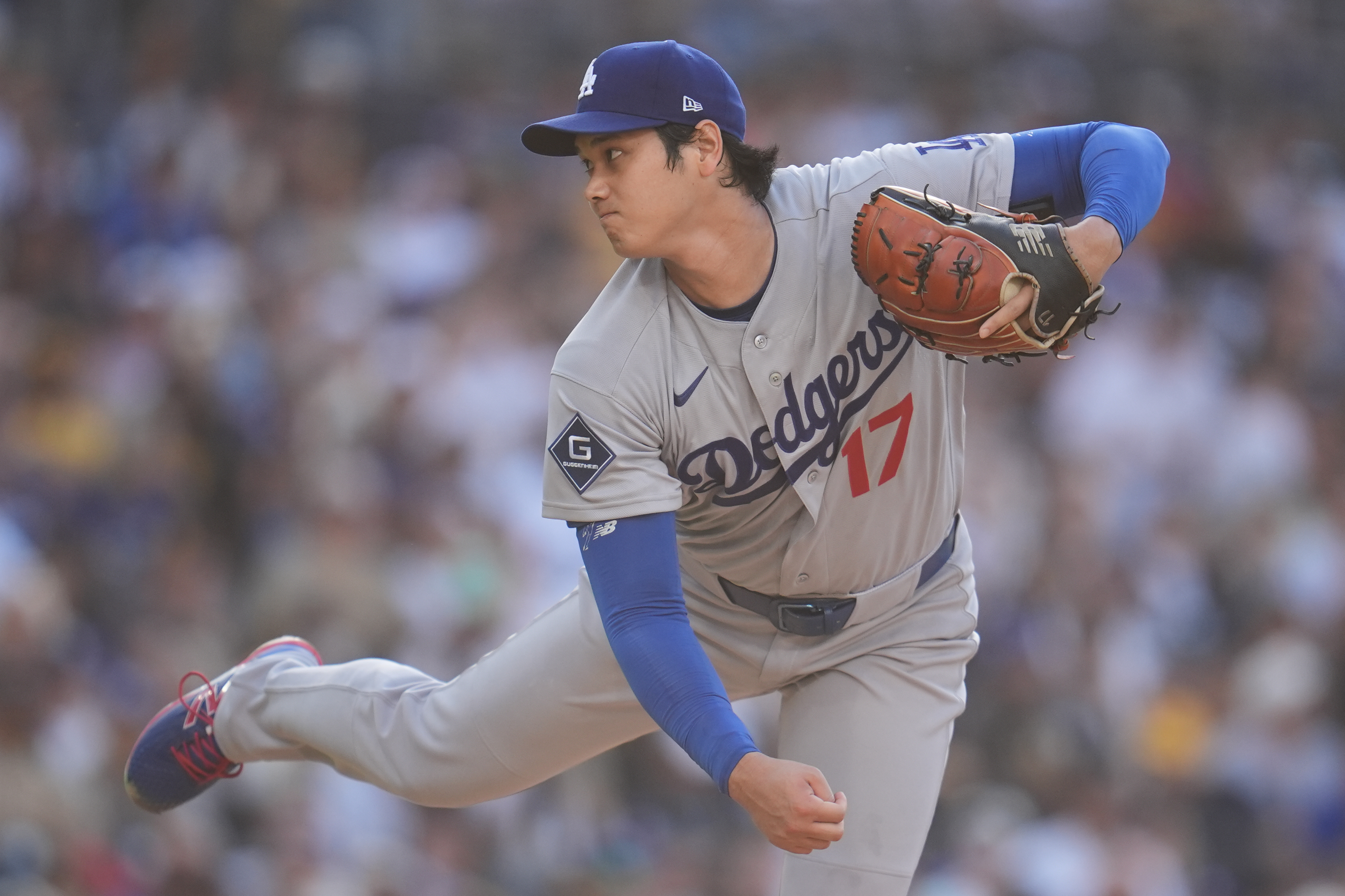Los Angeles Dodgers starting pitcher Shohei Ohtani works against a San Diego Padres batter during the first inning of a baseball game Wednesday, May 20, 2026, in San Diego. 