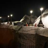 Artist JR, the 'French Banksy' creates a 'cave' installation over Paris' oldest bridge