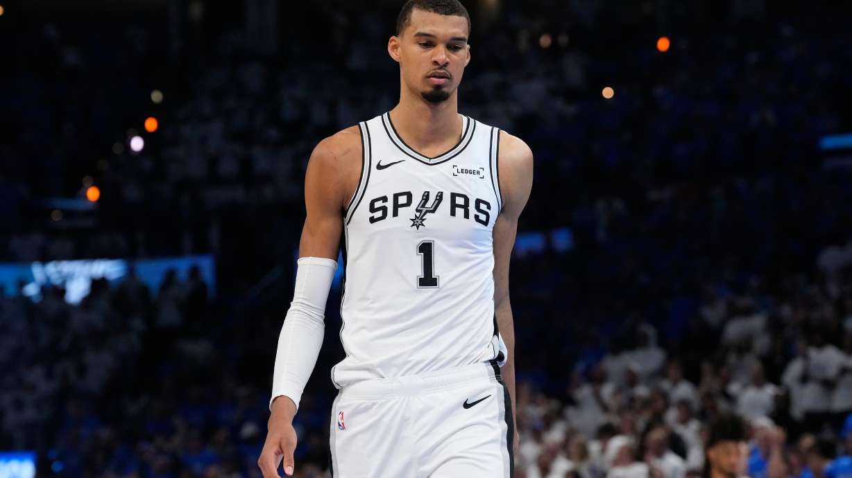 San Antonio Spurs forward Victor Wembanyama reacts after Game 2 in the Western Conference finals NBA basketball playoffs series against the Oklahoma City Thunder Wednesday, May 20, 2026, in Oklahoma City.