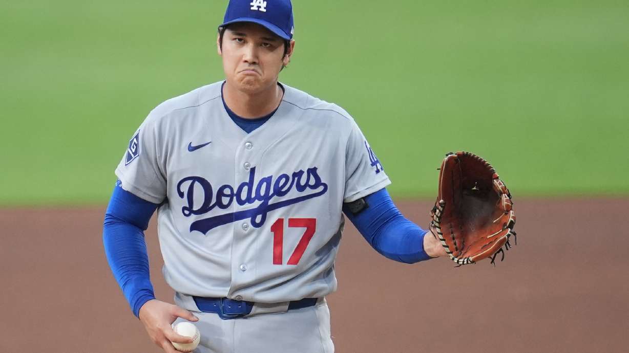 Los Angeles Dodgers starting pitcher Shohei Ohtani gestures as he works against a San Diego Padres batter during the fifth inning of a baseball game Wednesday, May 20, 2026, in San Diego.