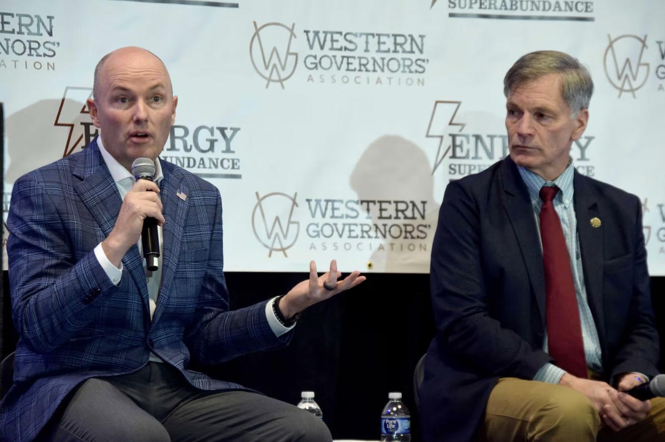 Utah Gov. Spencer Cox and Wyoming Gov. Mark Gordon discuss permitting during a Western Governors Association panel in Salt Lake City on Wednesday.