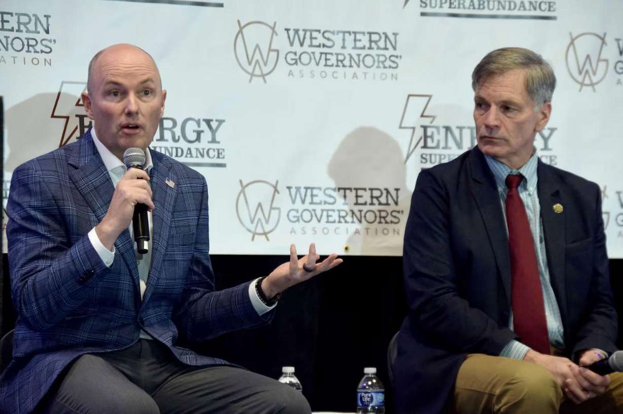 Utah Gov. Spencer Cox and Wyoming Gov. Mark Gordon discuss permitting during a Western Governors Association panel in Salt Lake City on Wednesday.