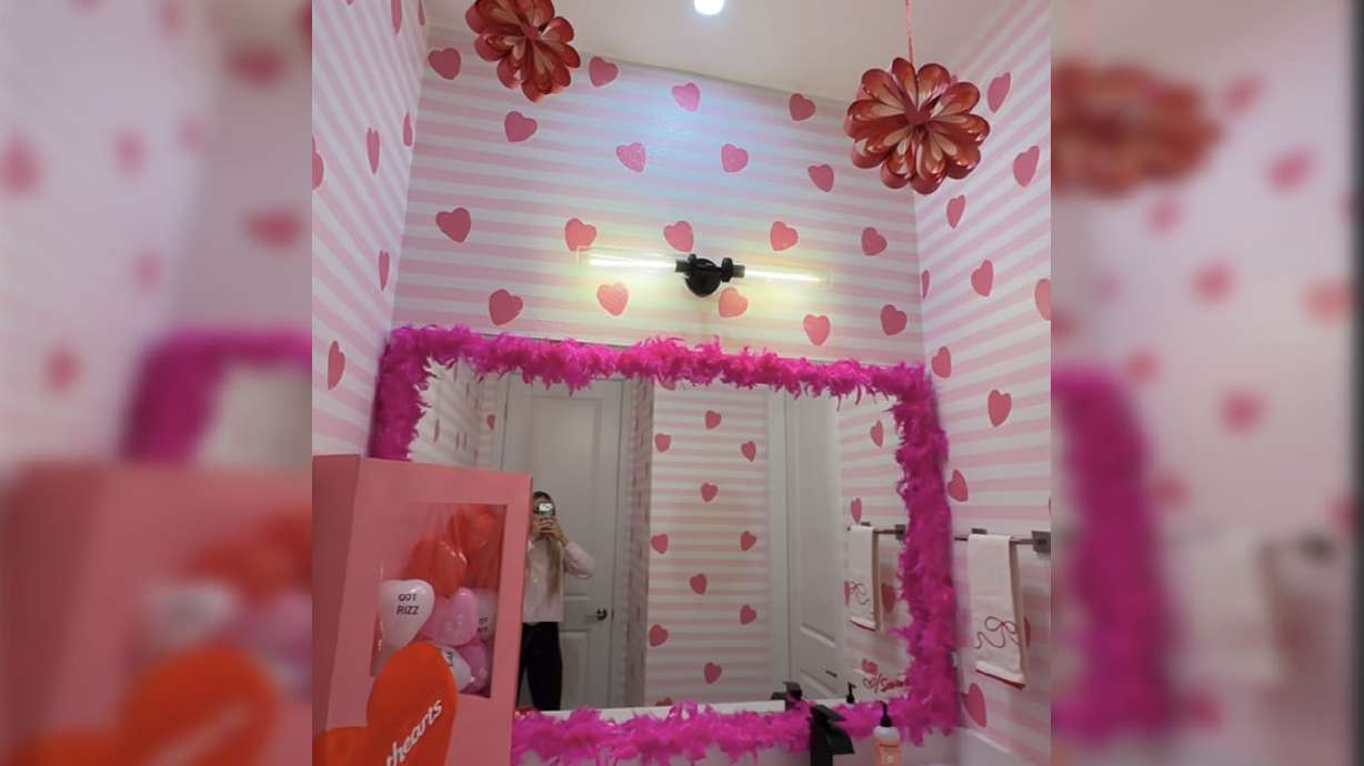 Social media content creator Serena Neel shows off her Valentine's Day themed bathroom.