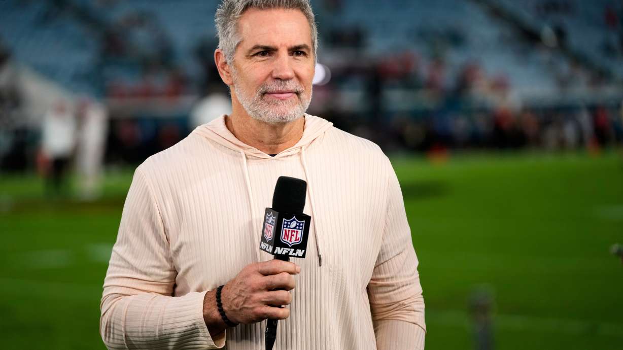 FILE - NFL Network analyst Kurt Warner reports before an NFL football game between the Jacksonville Jaguars and the Kansas City Chiefs, Oct. 6, 2025, in Jacksonville, Fla.
