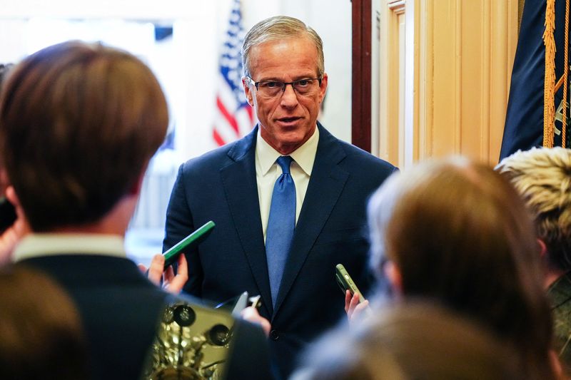 Senate Majority Leader John Thune, R-S.D., talks with reporters after leaving the Senate floor on Capitol Hill in Washington, April 28. The Senate walked away on Thursday from a planned vote on a $72 billion immigration bill over a proposed "anti-weaponization" fund, setting up a showdown with President Donald Trump.