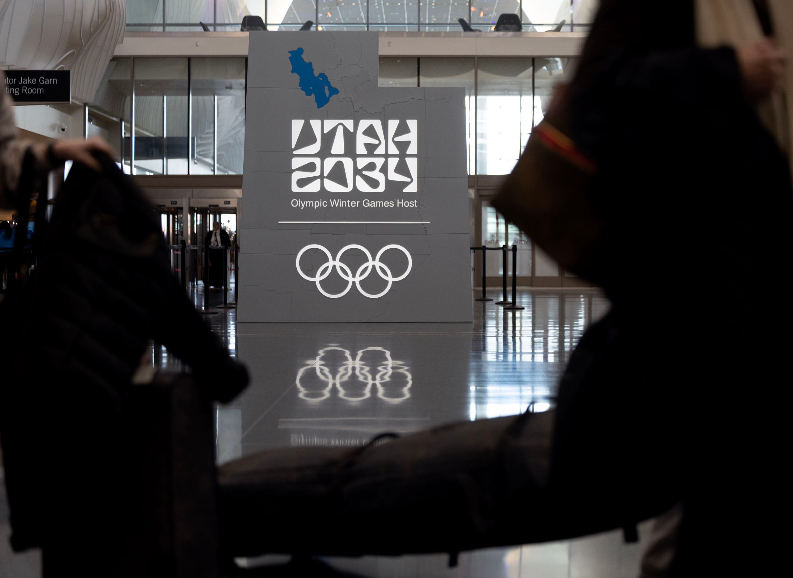 The “Utah 2034” Olympics logo at the Salt Lake City International Airport on Feb. 20. Organizers are undecided on imposing a fee on tickets, following the decision the Los Angeles City Council made on 2028 Summer Olympics tickets this week.