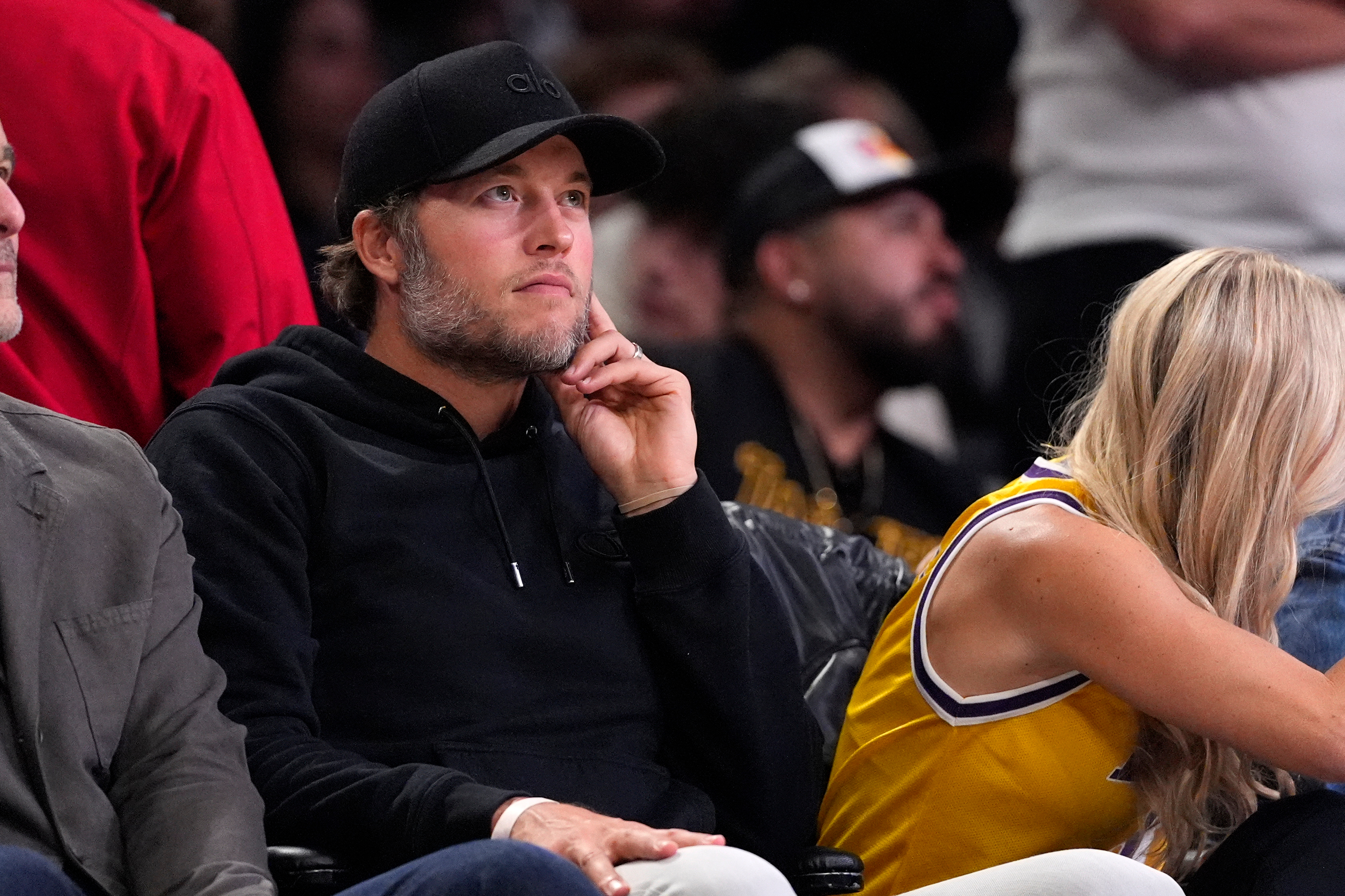 Los Angeles Rams quarterback Matthew Stafford watches during the second half in Game 2 of a first-round NBA playoffs basketball series between the Los Angeles Lakers and the Houston Rockets, Tuesday, April 21, 2026, in Los Angeles. 