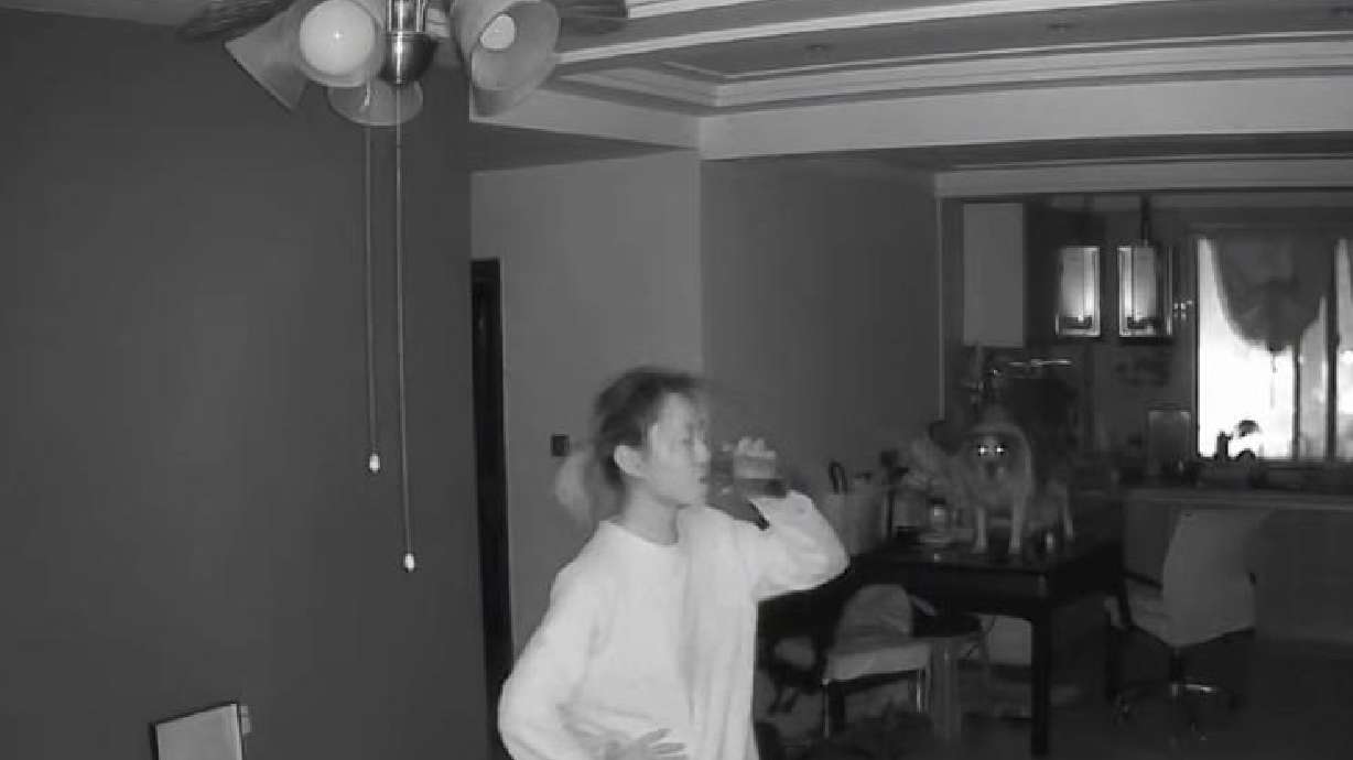 A woman in Hanan, China, gets a middle-of-the-night scare in this Jan. 3 video.