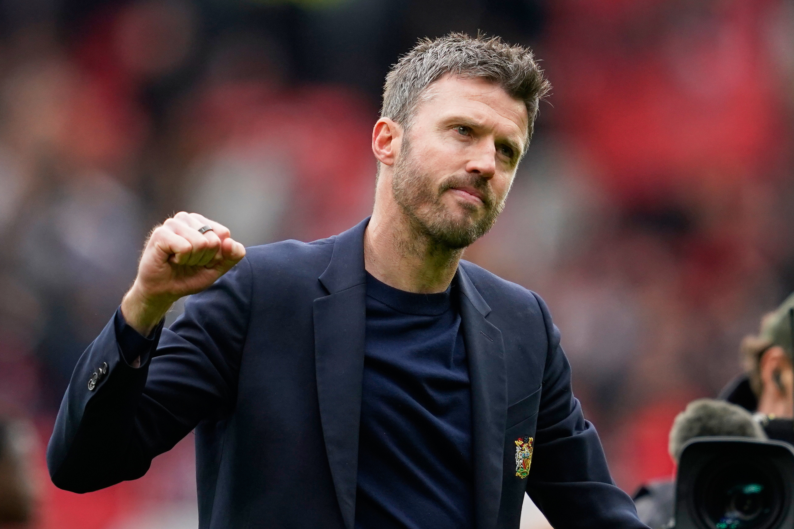 Manchester United's head coach Michael Carrick celebrates after the English Premier League soccer match between Manchester United and Liverpool in Manchester, England, Sunday, May 3, 2026. 