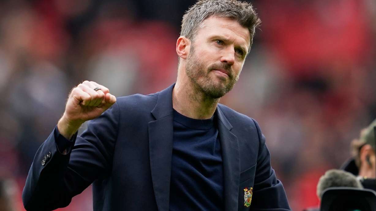 Manchester United's head coach Michael Carrick celebrates after the English Premier League soccer match between Manchester United and Liverpool in Manchester, England, Sunday, May 3, 2026.