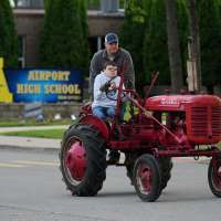 Tractors, ATVs and golf carts, oh my: Michigan seniors arrive at school in style on Tractor Day
