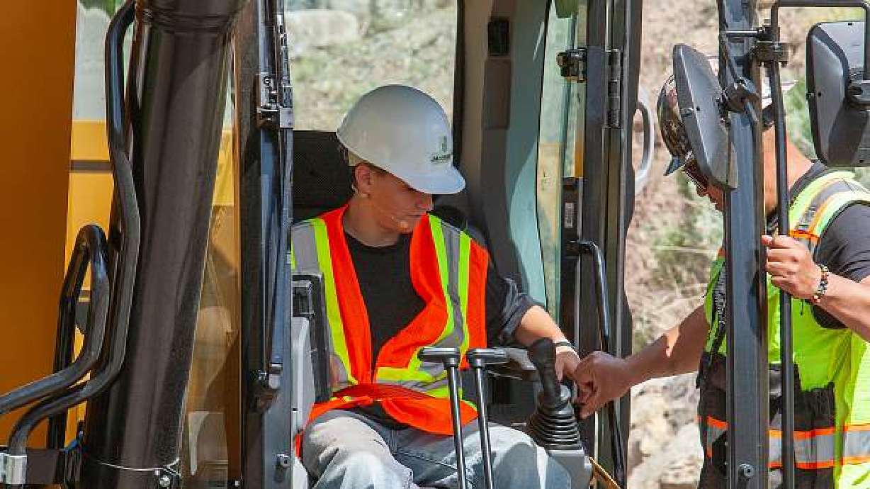 Former patient Noah Reeb prepares to break ground on an expansion of the Senator Orrin G. Hatch Proton Therapy Center at Huntsman Cancer Institute on May 8.