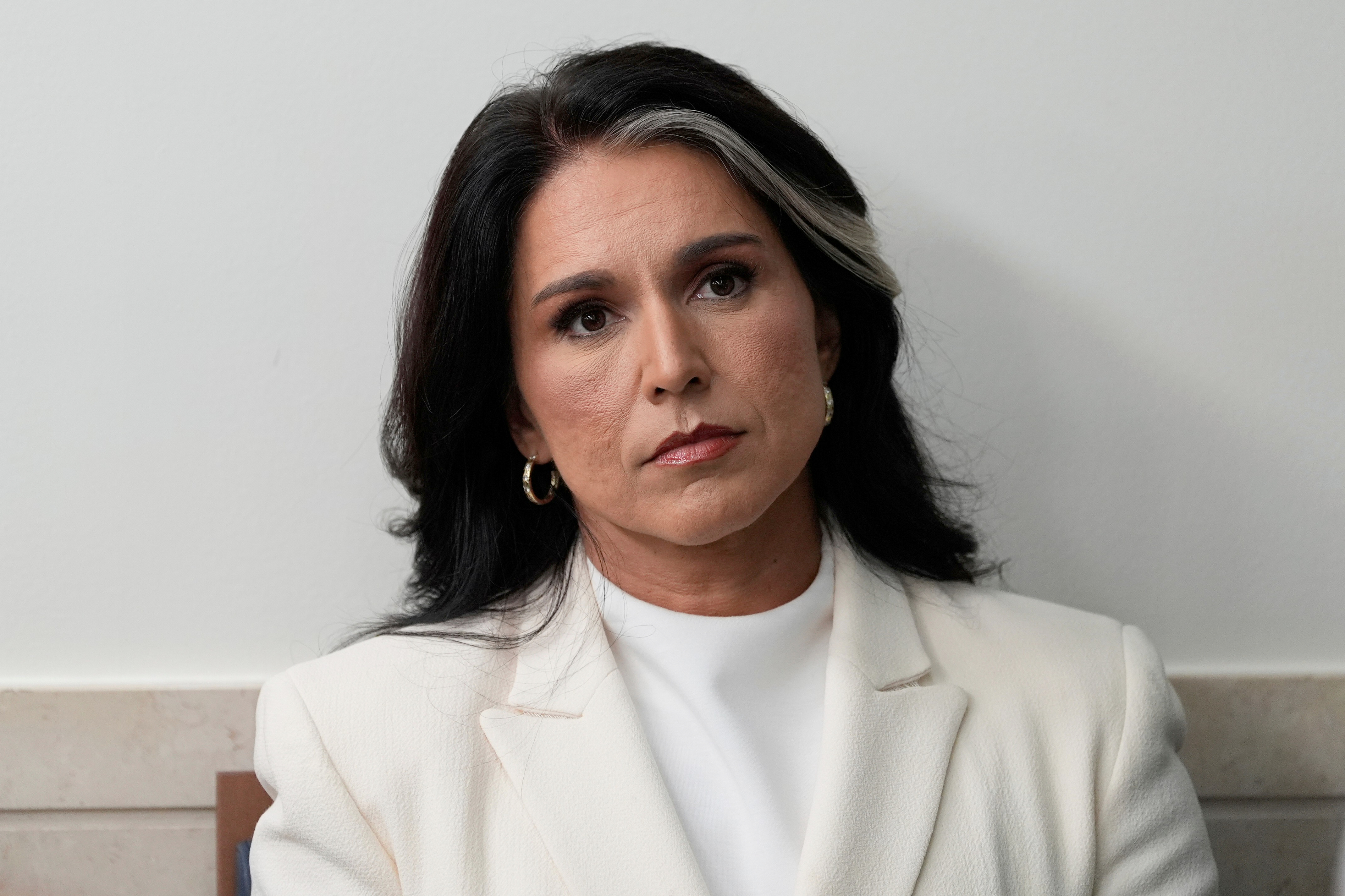 Tulsi Gabbard resigns as director of national intelligence, citing her husband's health