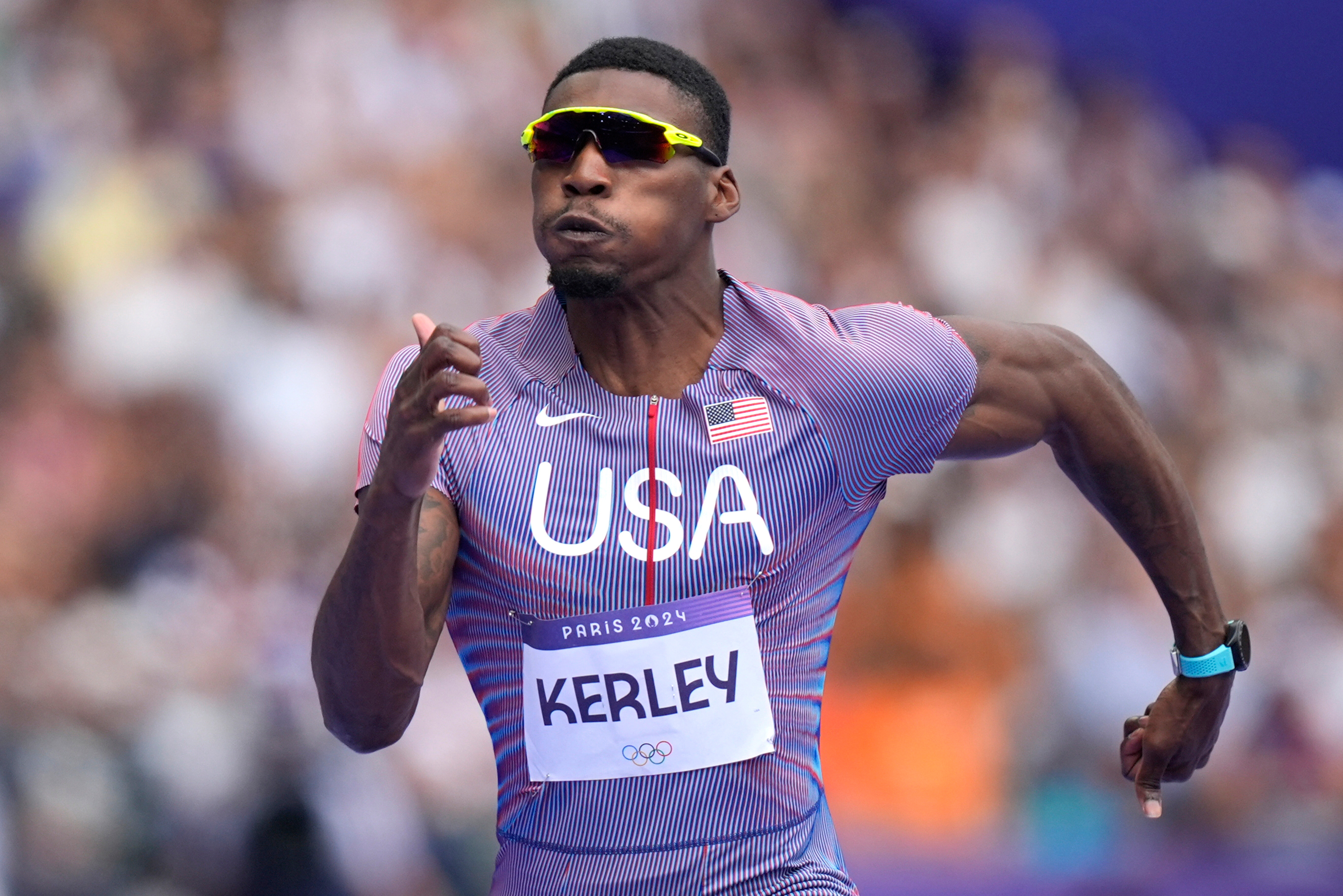 FILE - Fred Kerley, of the United States, competes in the men's 100-meter heats at the 2024 Summer Olympics, Aug. 3, 2024, in Saint-Denis, France. 
