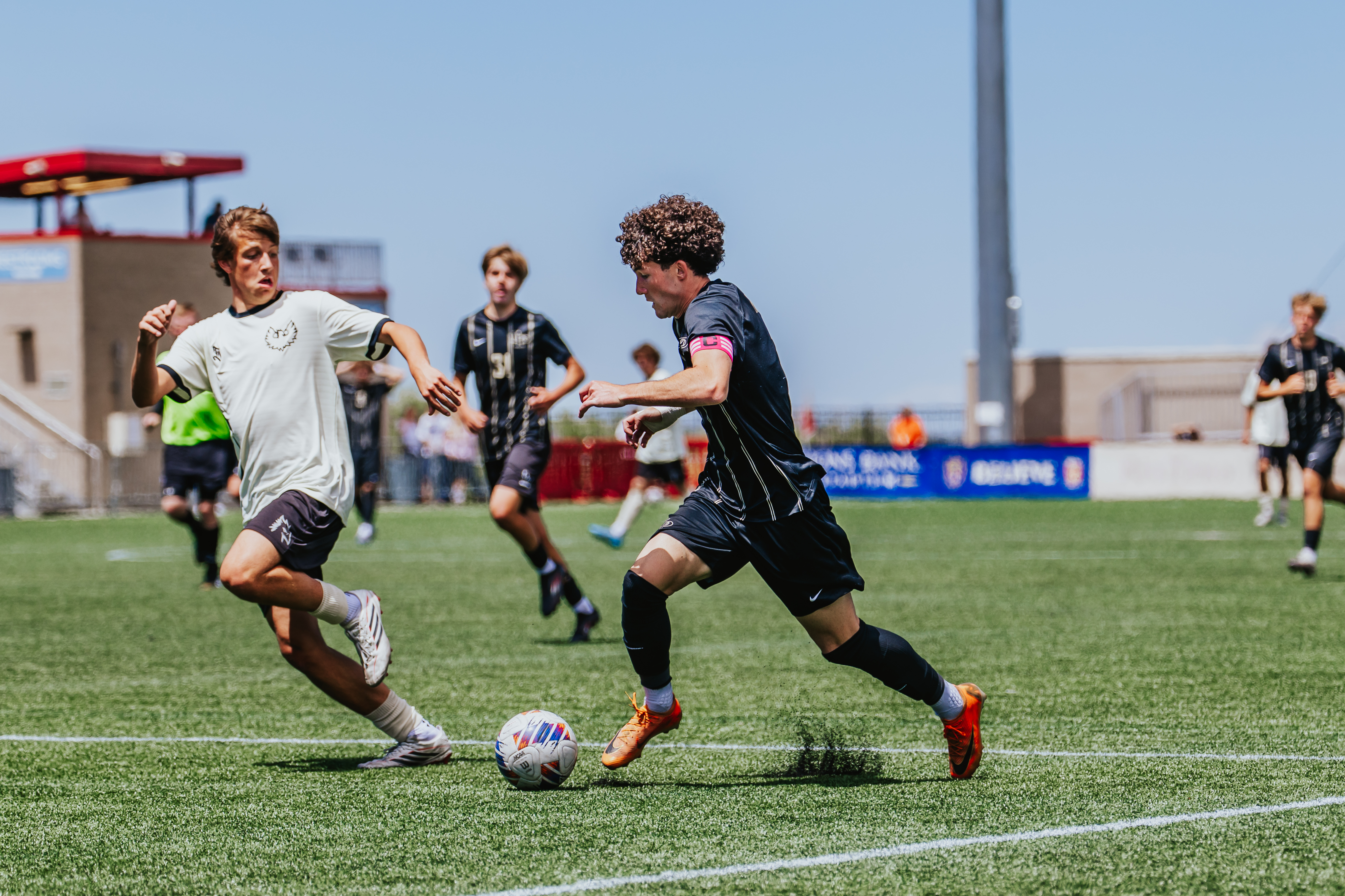Lone Peak's Patrick Stevenson dribbles the ball in the 6A boys soccer state championship match, Friday, May 22, 2026 at Zions Bank Stadium in Herriman. Lone Peak won, 3-1.