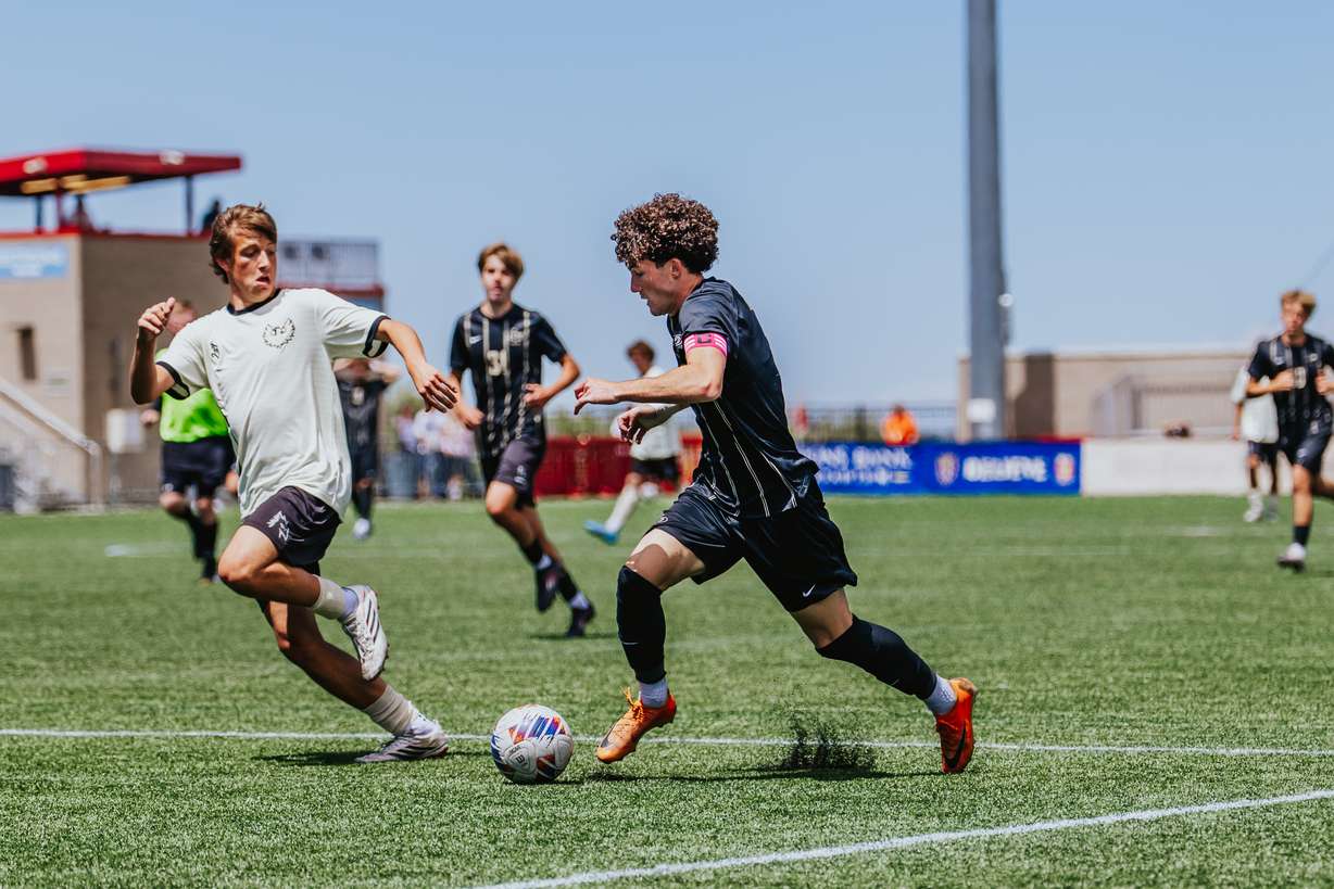 Lone Peak's Patrick Stevenson dribbles the ball in the 6A boys soccer state championship match, Friday, May 22, 2026 at Zions Bank Stadium in Herriman. Lone Peak won, 3-1.
