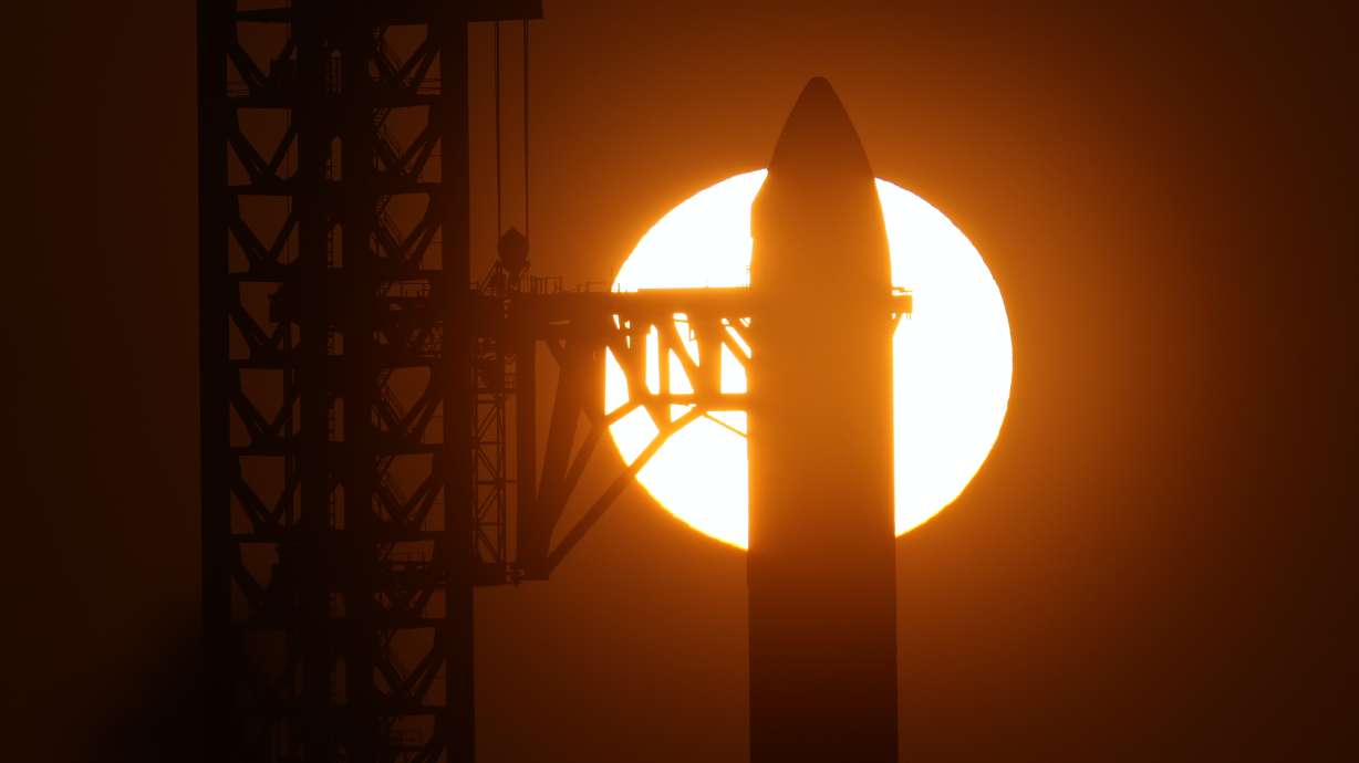 The sun rises behind SpaceX's mega rocket Starship as it is prepared for a test flight from Starbase, Texas, Friday. SpaceX test-flighted its biggest rocket yet, which NASA is counting on to get astronauts to the moon.