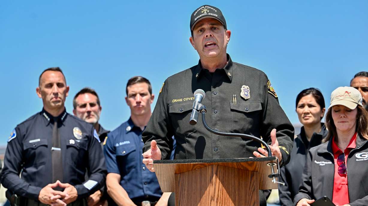 Orange County Fire Authority Division Chief Craig Covey speaks during a news conference at the Los Alamitos racetrack in Cypress, Calif., Friday, about the hazmat situation in Garden Grove, Calif.