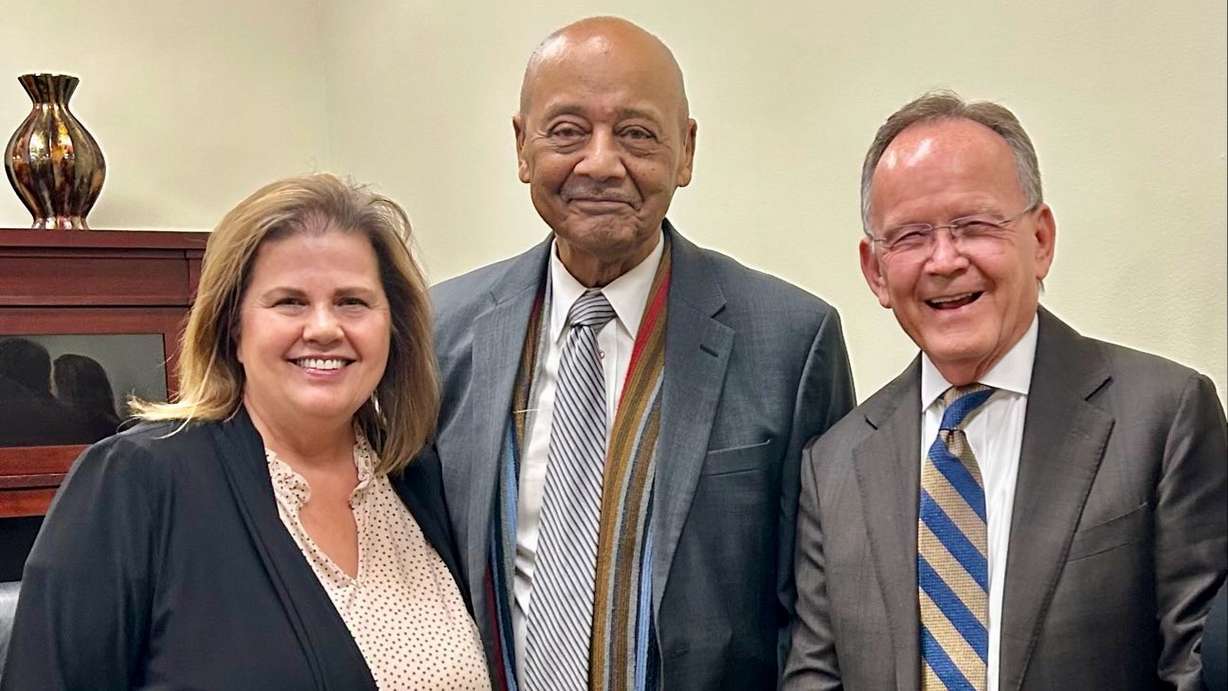 The death of conservative civil rights activist Robert Woodson, center in the photo, is having ripple effects in Utah, where he was a regular visitor. He's pictured in an undated photo with Jamie Renda, left, and Utah Sen. President Stuart Adams.