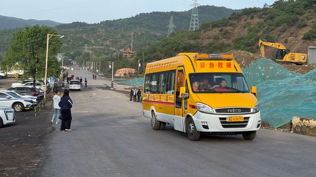A scene at the rescue site of the Liushenyu coal mine in Changzhi city, China's Shanxi Province, Saturday. Officials said at least 82 people have died in the country's deadliest mining accident in recent years.