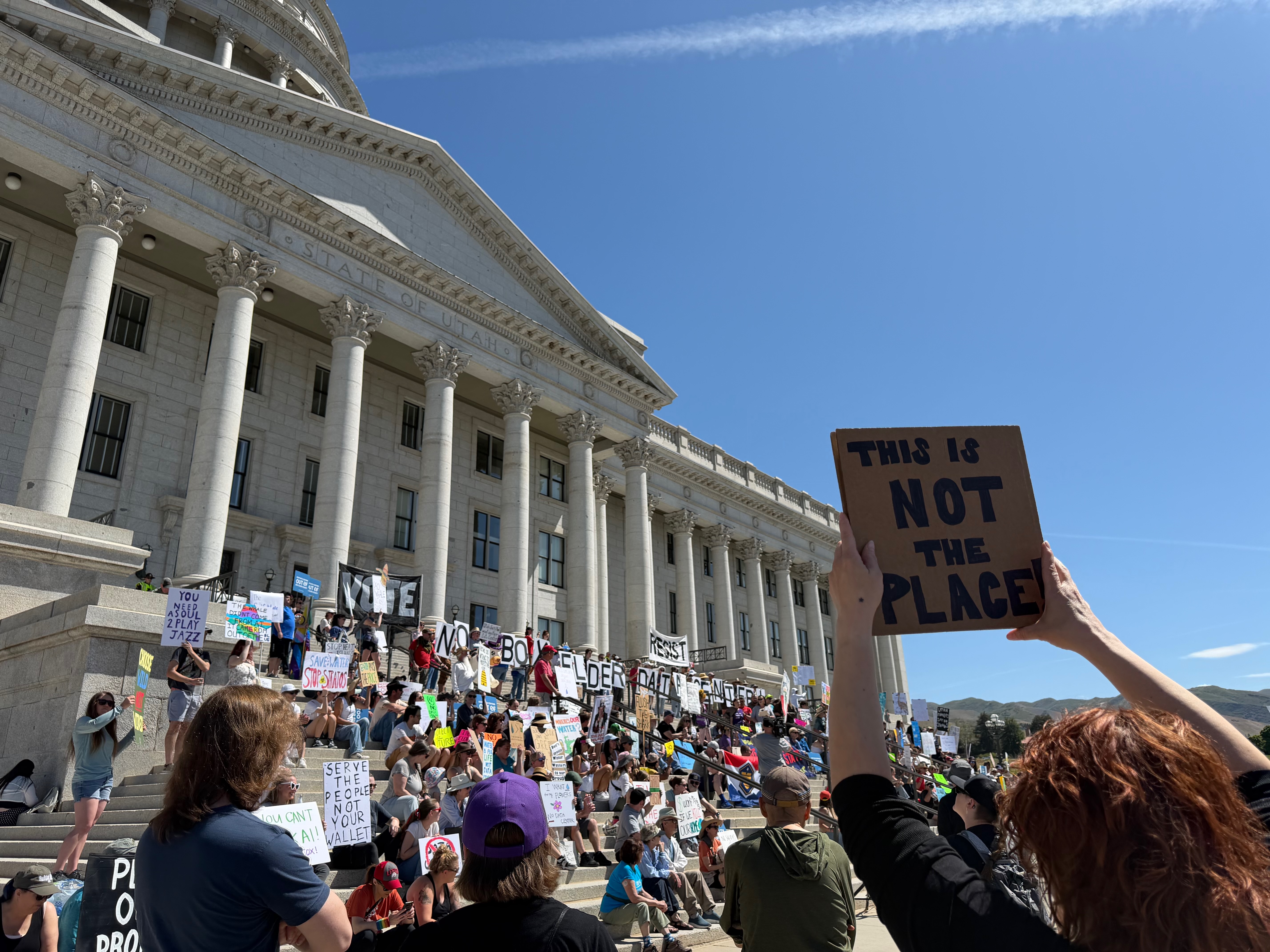 People rally at the Utah Capitol on Saturday against a proposed data center project in Box Elder County.