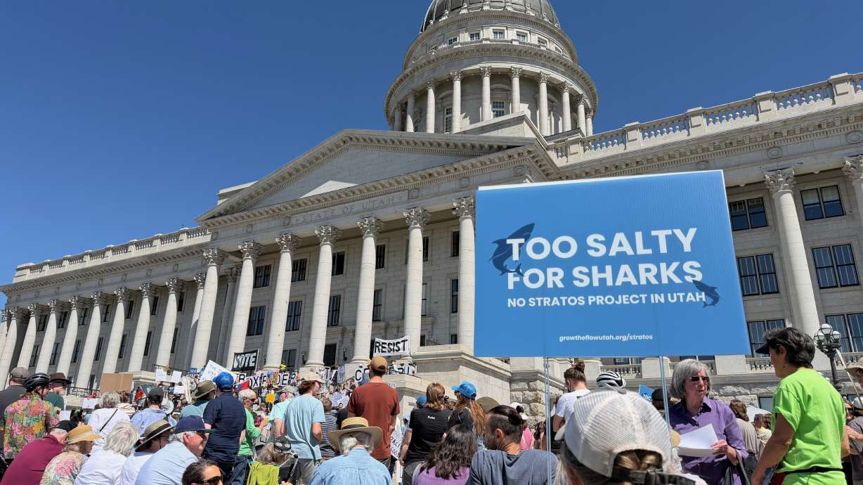 People rally at the state Capitol in Salt Lake City on Saturday against a proposed data center project in Box Elder County.