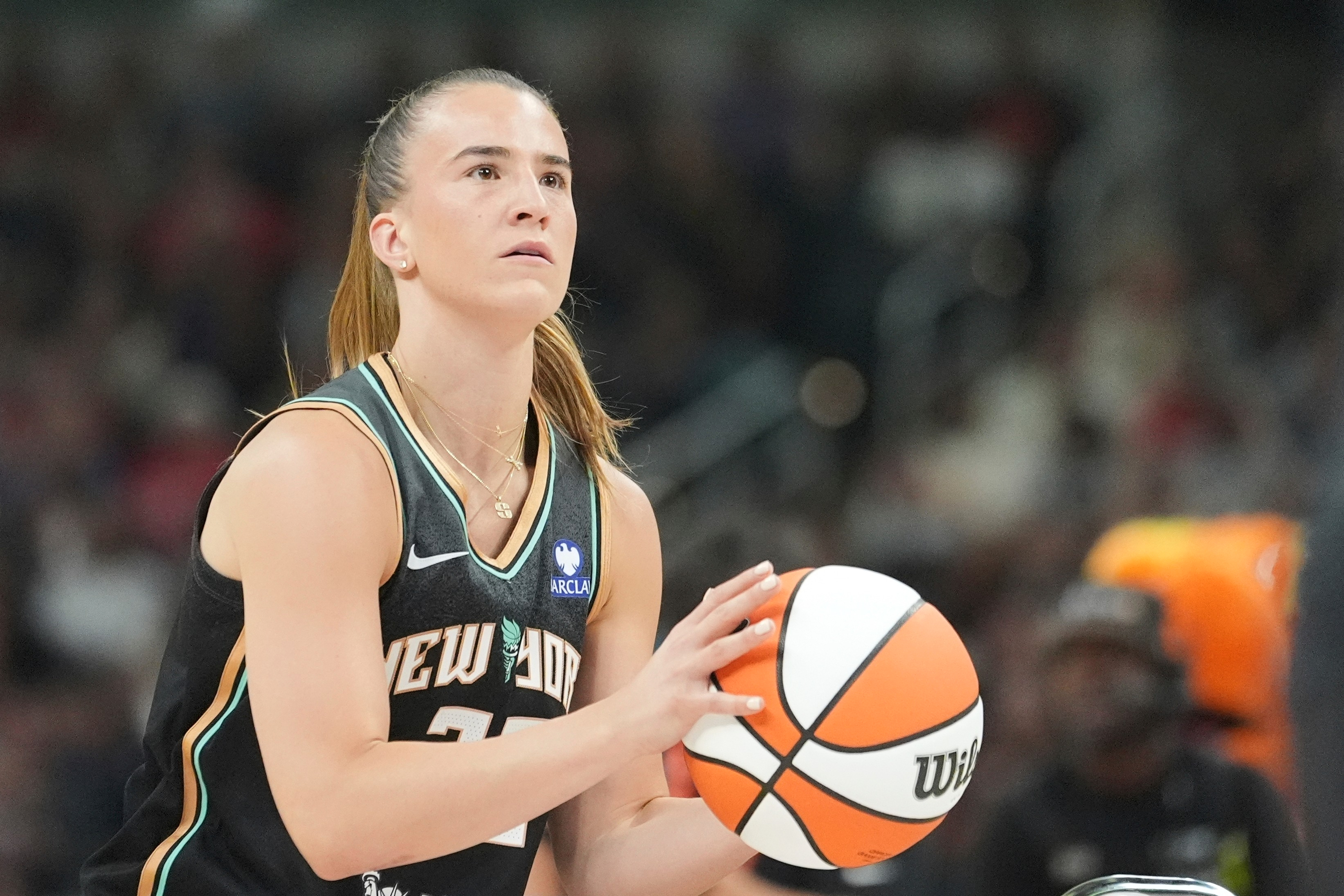 FILE - New York Liberty's Sabrina Ionescu shoots during the 3-point contest at the WNBA All-Star basketball weekend, July 18, 2025, in Indianapolis. 