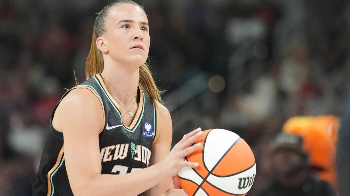 FILE - New York Liberty's Sabrina Ionescu shoots during the 3-point contest at the WNBA All-Star basketball weekend, July 18, 2025, in Indianapolis.
