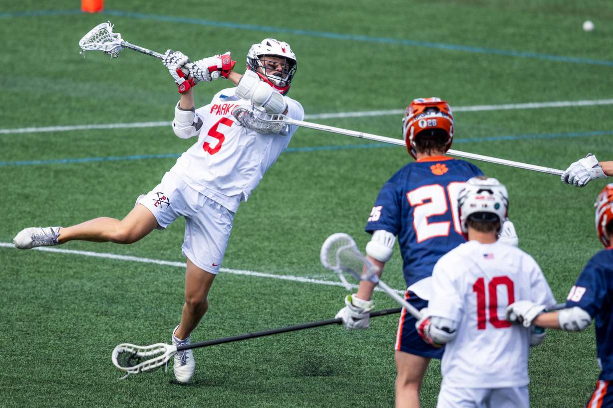 Park City's Brett Hughes (5) shoots against Brighton during the 5A boys lacrosse championship game at Zions Bank Stadium in Herriman, on Saturday, May 23, 2026.