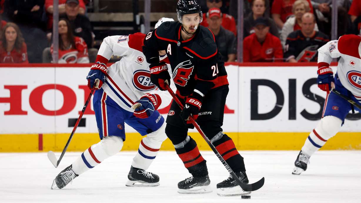 Carolina Hurricanes' Sebastian Aho (20) controls the puck against the Montreal Canadiens during the first period in Game 2 of the Eastern Conference finals NHL hockey Stanley Cup playoff series in Raleigh, N.C., Saturday, May 23, 2026.