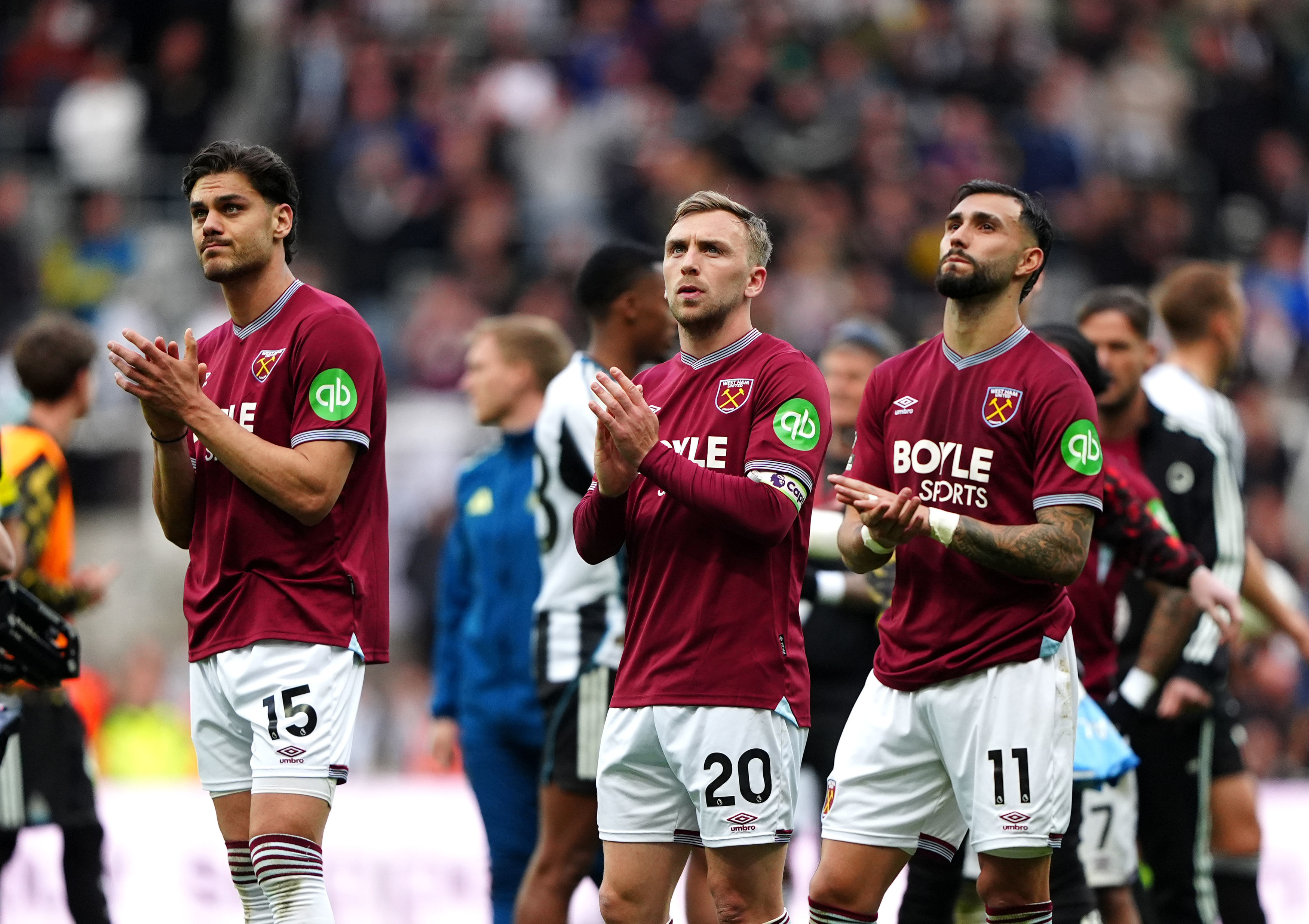 From left, West Ham United's Konstantinos Mavropanos, Jarrod Bowen and Valentin Castellanos applauds the fans following their English Premier League soccer match against Newcastle United in Newcastle upon Tyne, England, Sunday, May 17, 2026. 