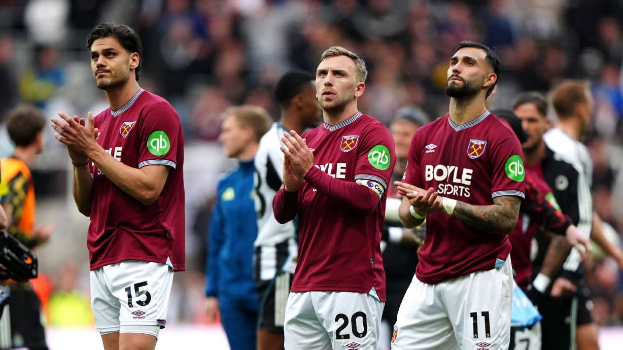 From left, West Ham United's Konstantinos Mavropanos, Jarrod Bowen and Valentin Castellanos applauds the fans following their English Premier League soccer match against Newcastle United in Newcastle upon Tyne, England, Sunday, May 17, 2026.