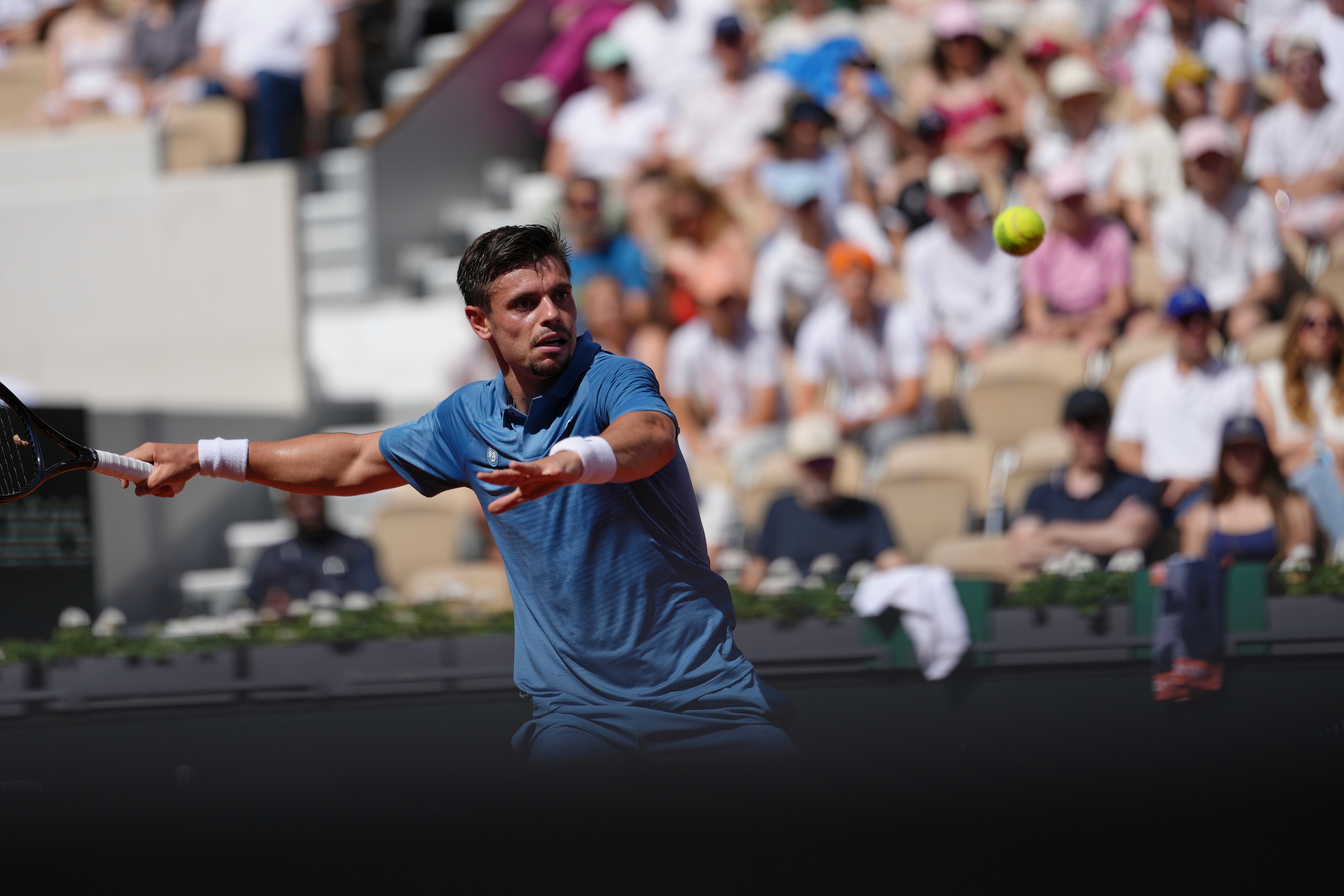 Arthur Gea of France returns to Karen Khachanov of Russia during the first round men's singles tennis match at the French Open tennis tournament in Paris, Sunday, May 24, 2026. 