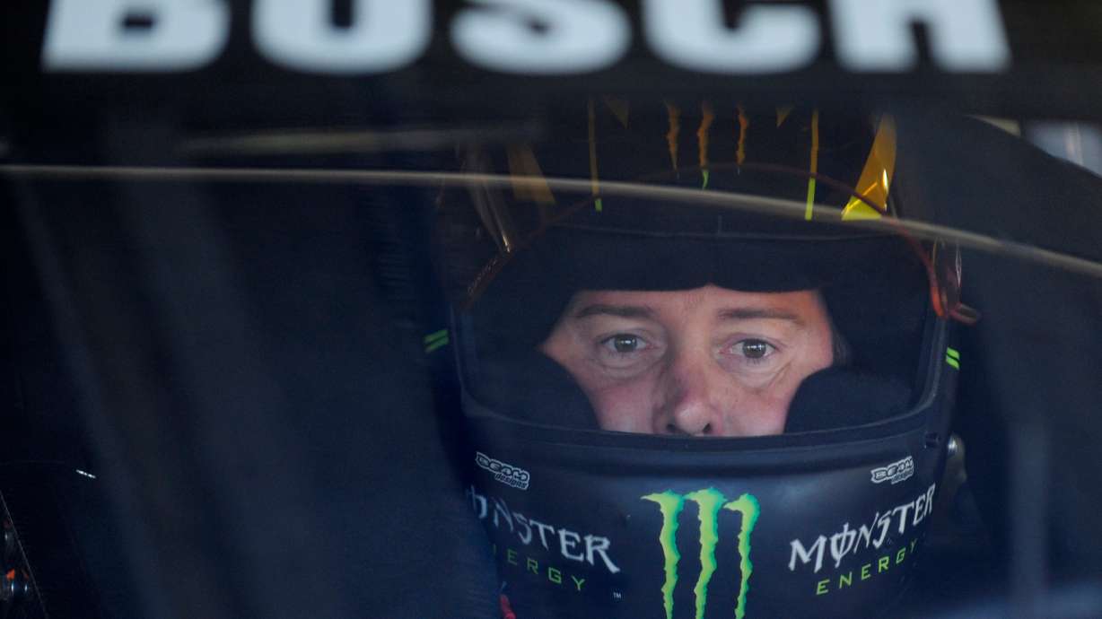 FILE - Kurt Busch waits in his car before practice for Sunday's NASCAR Sprint Cup series Coca-Cola 600 auto race at Charlotte Motor Speedway in Concord, N.C., Saturday, May 25, 2013. CORRECTION: Driver ID corrected to Kurt Busch, not Kyle Busch.