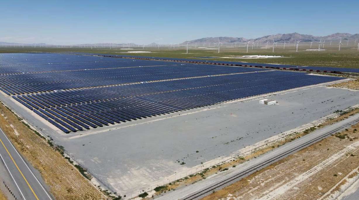 Solar fields and wind turbines near the site of the FORGE geothermal demonstration sight near Milford on July 6, 2023.