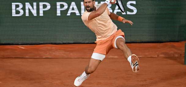Novak Djokovic overcomes a slow start and hostile crowd in 1st-round win at French Open