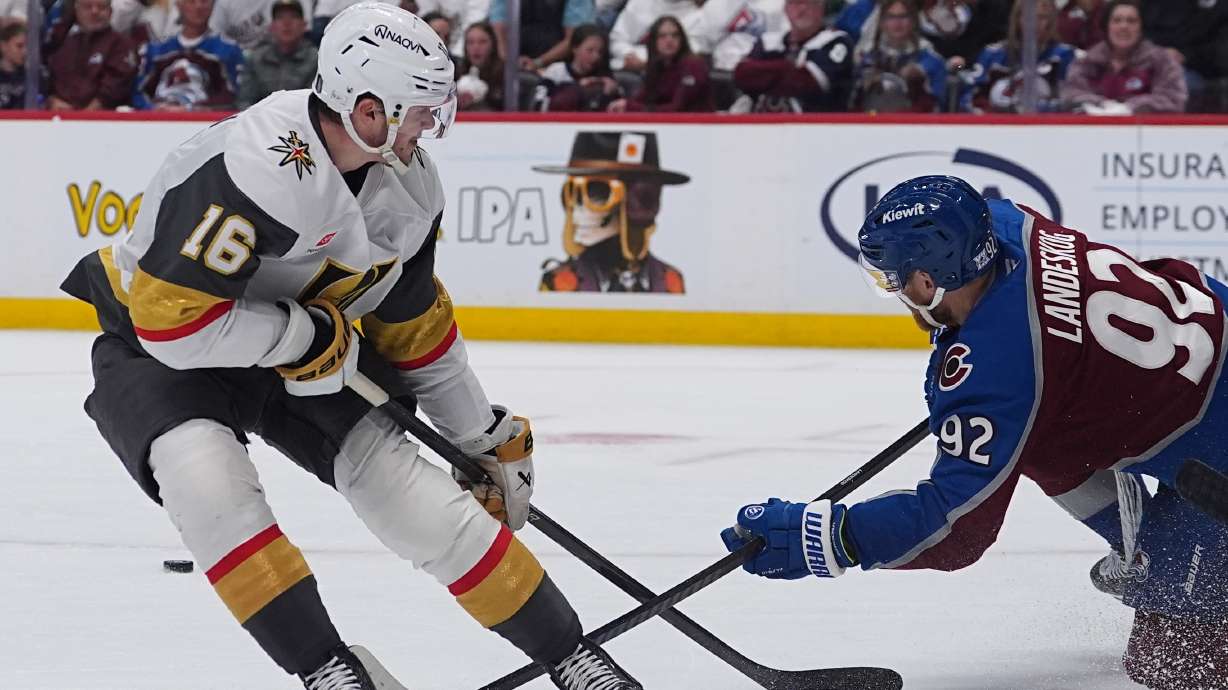 Colorado Avalanche left wing Gabriel Landeskog, right, blocks the shot by Vegas Golden Knights right wing Pavel Dorofeyev during the second period in Game 1 of the Western Conference finals NHL hockey Stanley Cup playoff series Wednesday, May 20, 2026, in Denver.