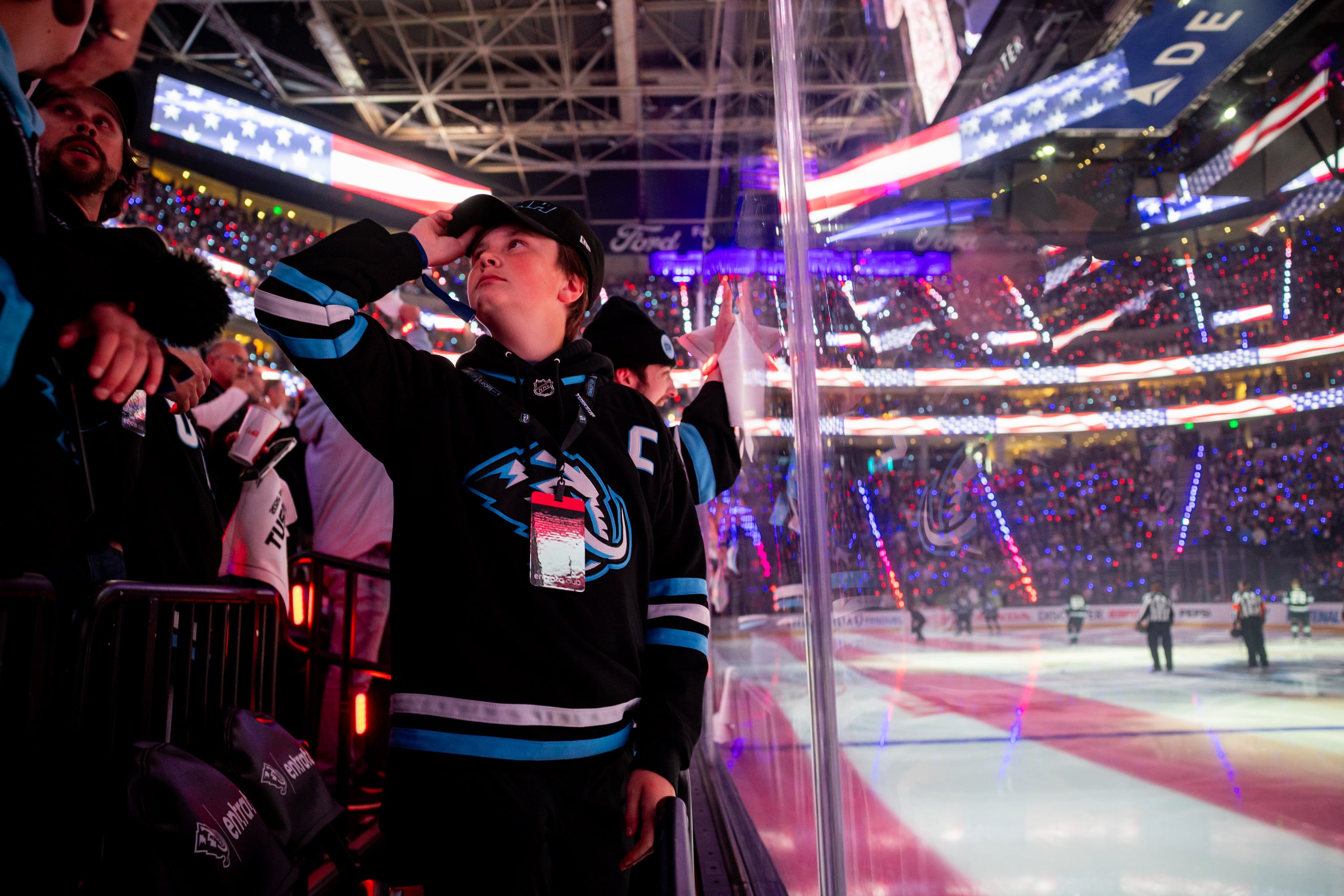 Utah Mammoth fan Quaide Garcia, 13, stands for the National Anthem before Game 6 of a first-round NHL Stanley Cup playoff series against the Vegas Golden Knights at the Delta Center in Salt Lake City on May 2.